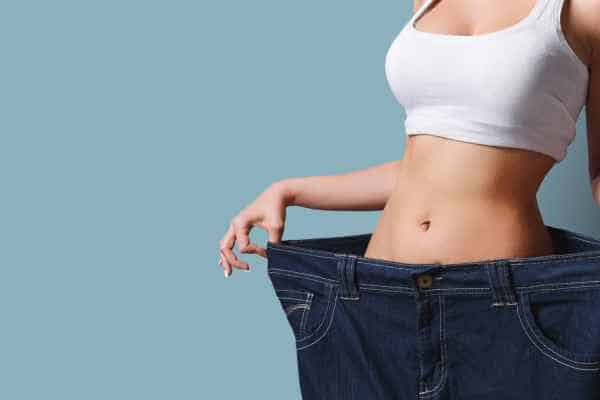 woman after fat reduction treatment Earls Barton