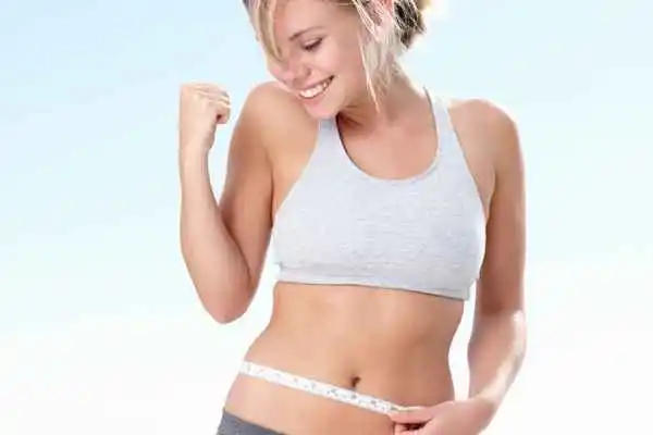woman happy after fat reduction treatment Earls Barton