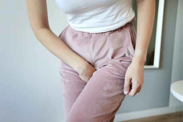 woman struggling with urine incontinence Earls Barton
