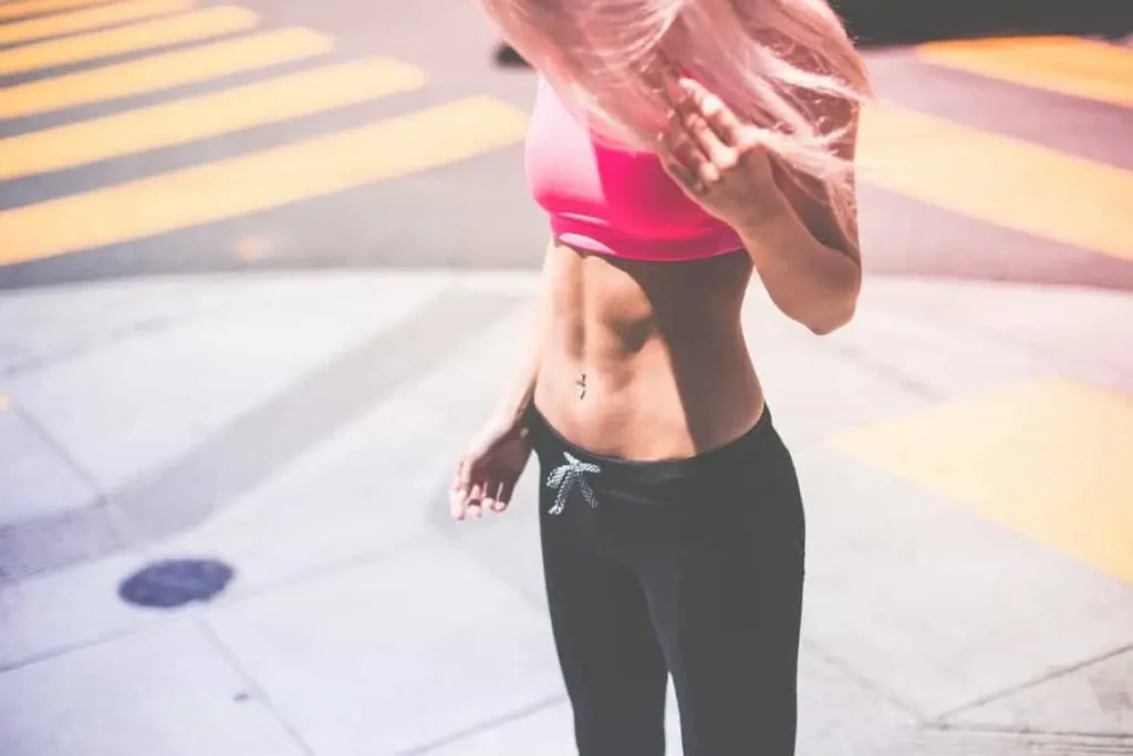 Woman with toned stomach after LA-EMS Body Sculpting Treatment Earls Barton